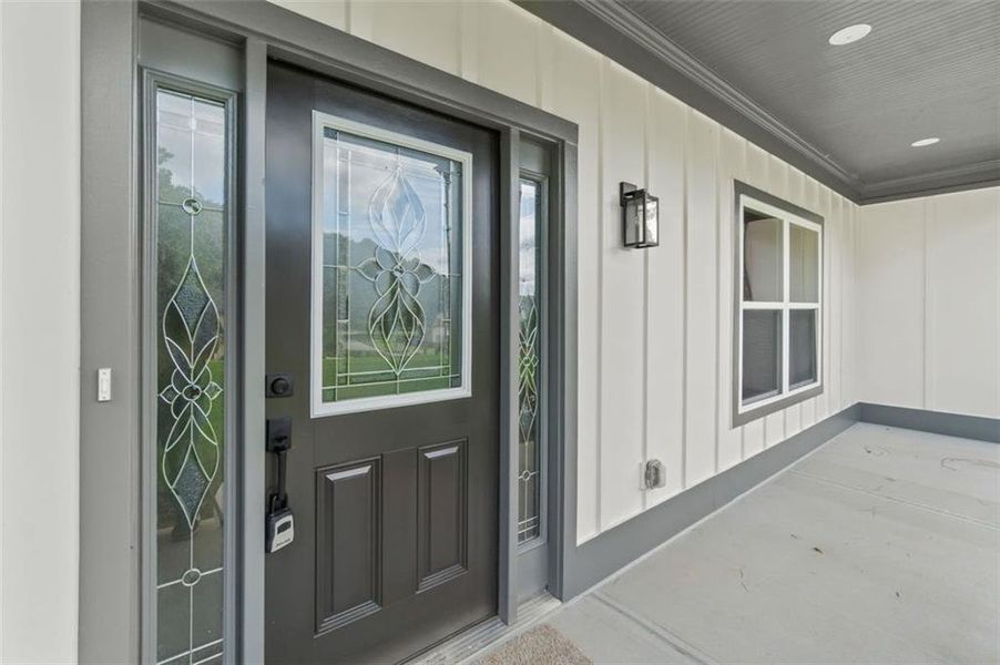 Front exterior of a new home in , Lithonia, GA, highlighting curb appeal (Image 24).