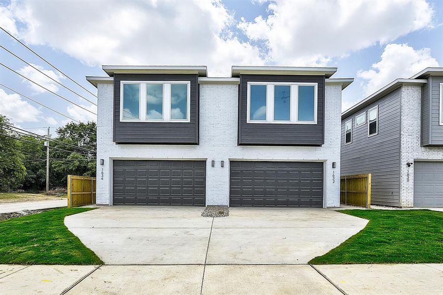 View of front of home with a garage