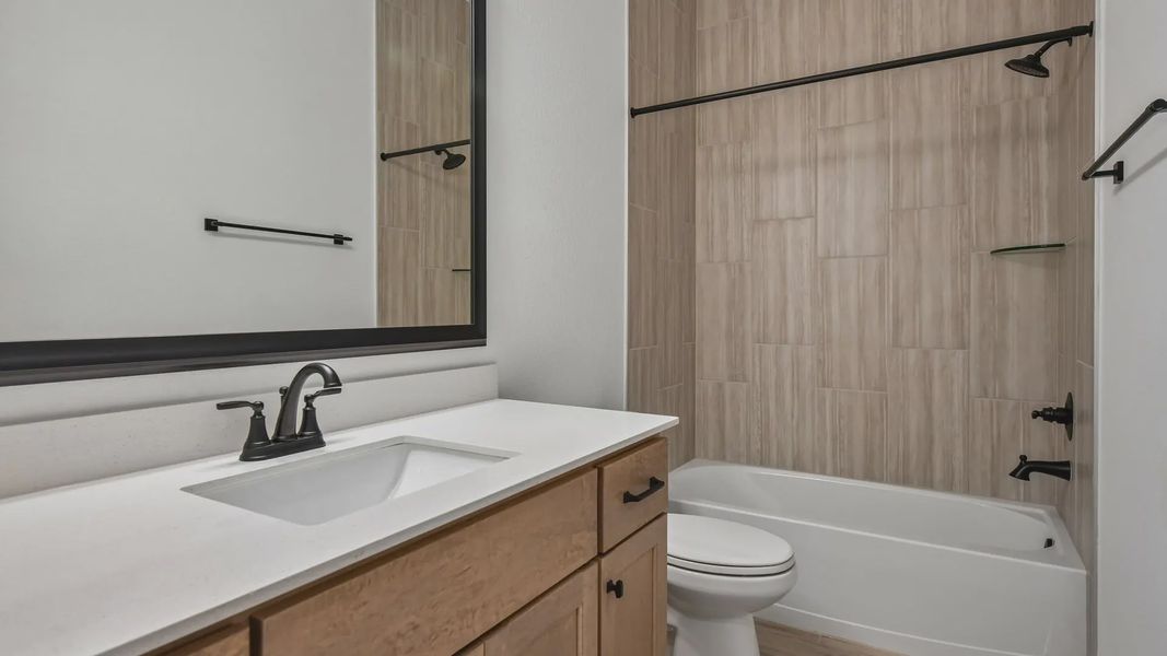 Furnished interior view inside a new home in Artavia, Conroe (Image 16).