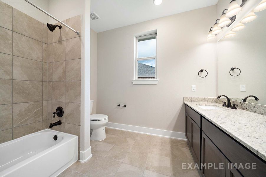 Representative furnished interior of a home built from the The Elizabeth by Davidson Homes LLC in Lago Mar, Texas City (Image 25).