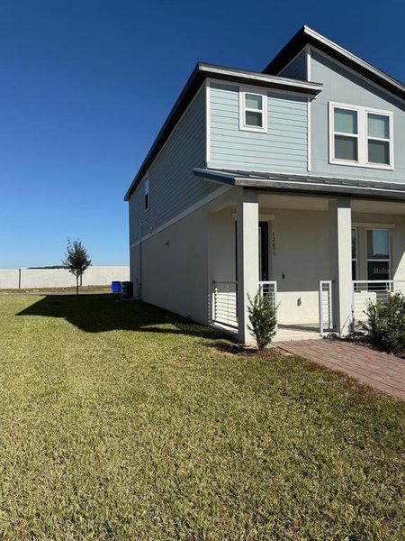 Exterior details and patio area of a home in , Winter Garden (Image 2). Exterior details and patio area of a home in , Winter Garden (Image 2).