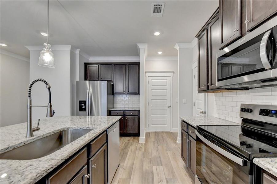 Furnished interior view inside a new home in , Auburn (Image 4).