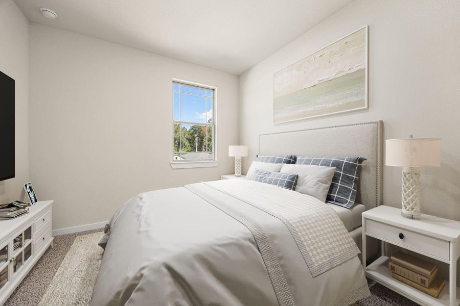 A spacious secondary bedroom with clean lines, neutral colors, and a bright window view, offering comfort and versatility for any lifestyle. A spacious secondary bedroom with clean lines, neutral colors, and a bright window view, offering comfort and versatility for any lifestyle.