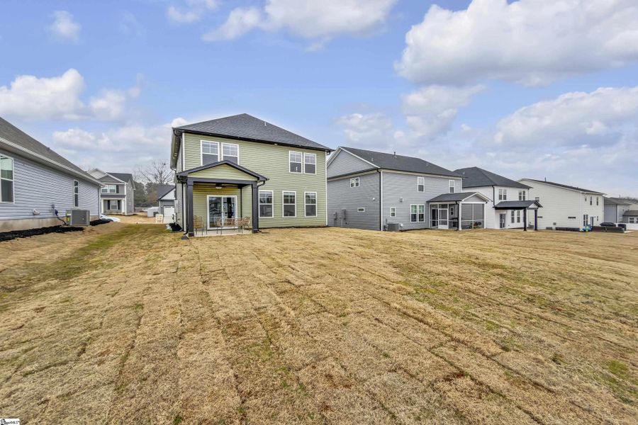 Exterior details and patio area of a home in Sedona, Greenville (Image 22).