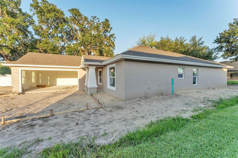Front exterior of a new home in , Bartow, FL, highlighting curb appeal (Image 28).