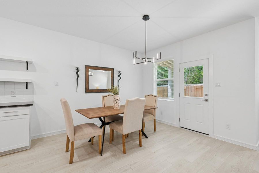 Sun-lit dining area Sun-lit dining area