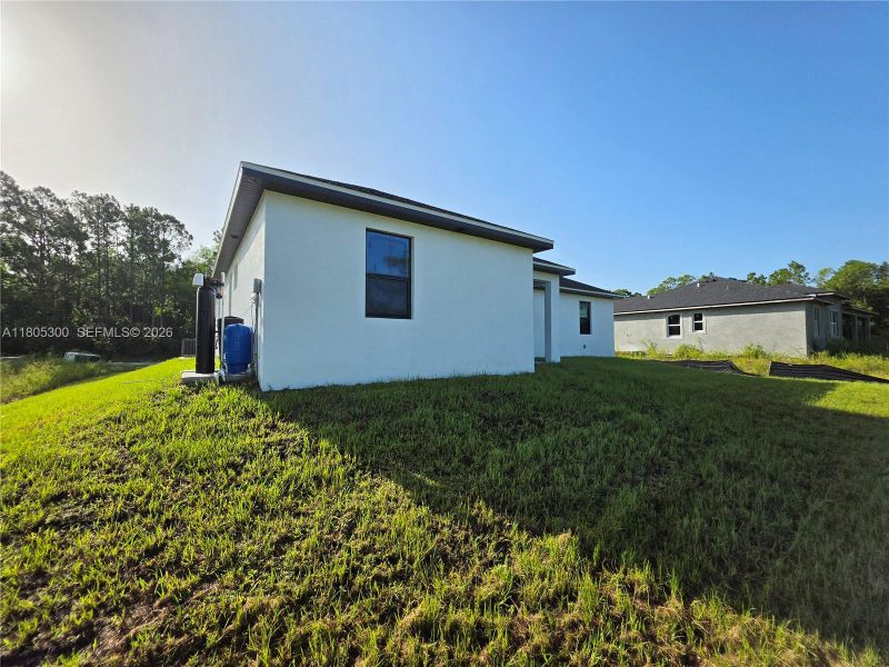 Exterior details and patio area of a home in , Lehigh Acres (Image 24).