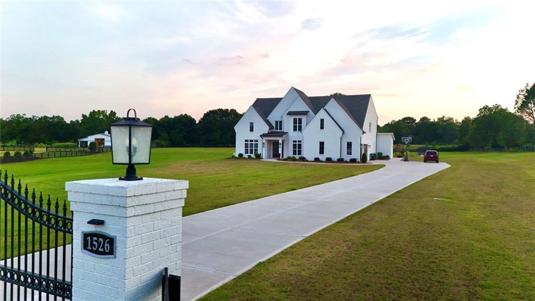 Front exterior of a new home in , Bishop, GA, highlighting curb appeal (Image 32). Front exterior of a new home in , Bishop, GA, highlighting curb appeal (Image 32).