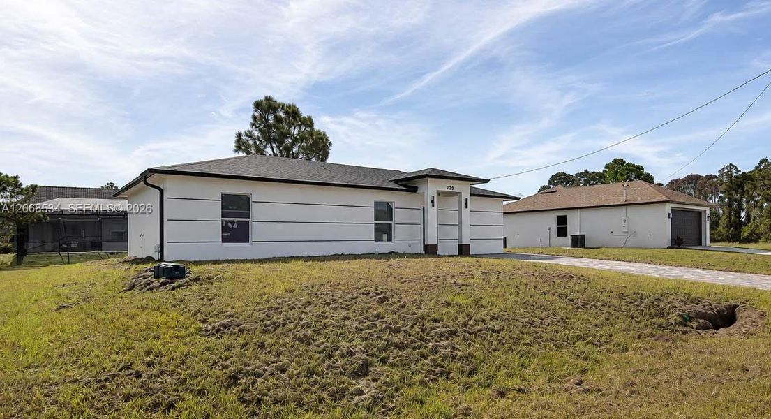 Exterior details and patio area of a home in , Lehigh Acres (Image 19).