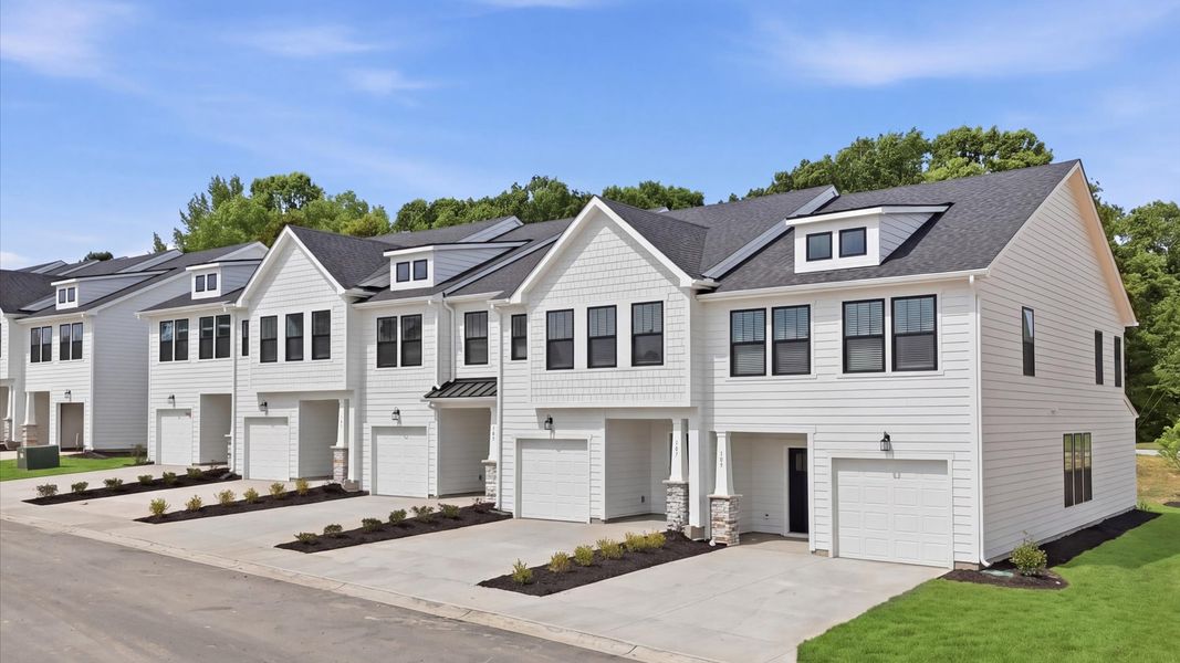 Front exterior of a new home in Gresham Station, Simpsonville, SC, highlighting curb appeal (Image 21).