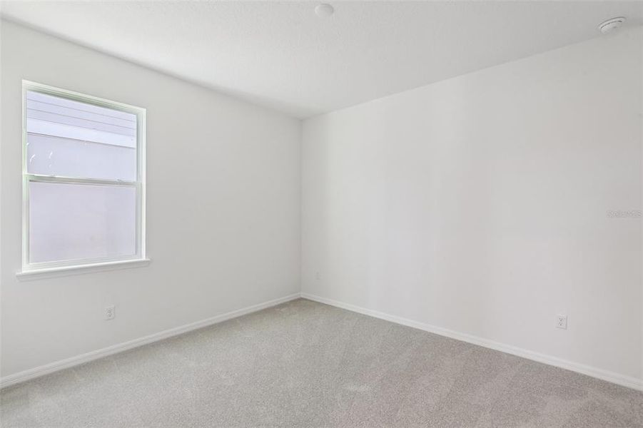 Spacious, unfurnished interior of a new home in Primrose at Longleaf, New Port Richey (Image 38).