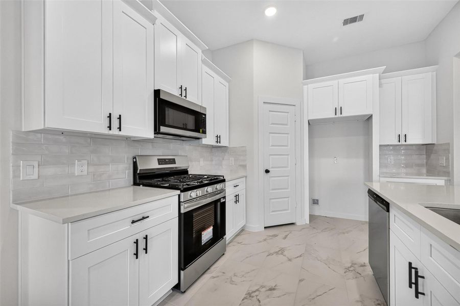 Furnished interior view inside a new home in Foxtail Palms, Manvel (Image 7).