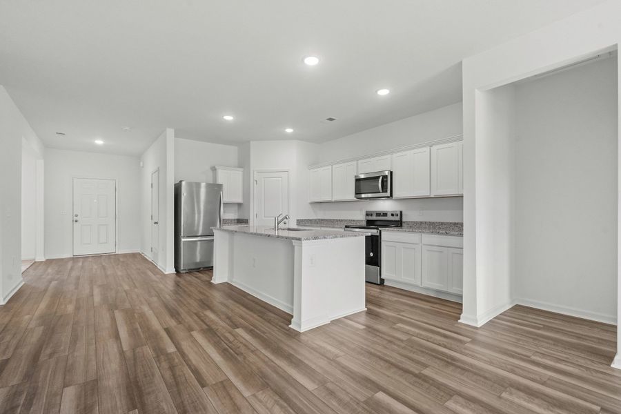 Representative furnished interior of a home built from the Sagan by Starlight Homes in Cottonwood Creek, San Marcos (Image 9).