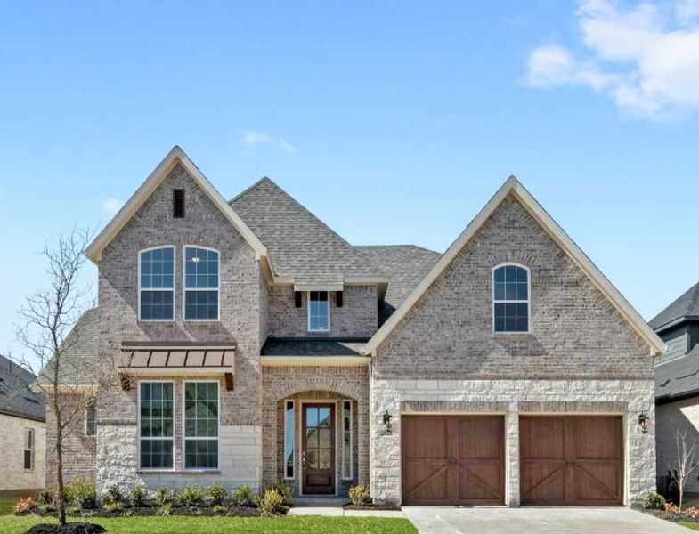 Representative exterior photo of a completed home built from the Eastland by UnionMain Homes in Cambridge Crossing, Celina, TX (Image 24). Representative exterior photo of a completed home built from the Eastland by UnionMain Homes in Cambridge Crossing, Celina, TX (Image 24).