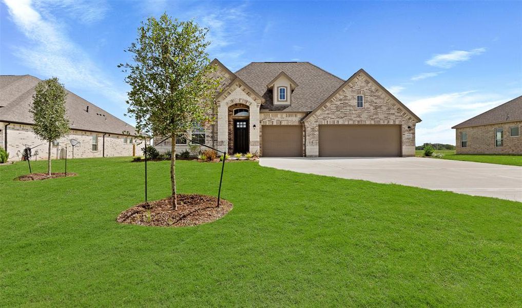 Charming Walden design by K. Hovnanian Homes in elevation E built in Tejas Landing.