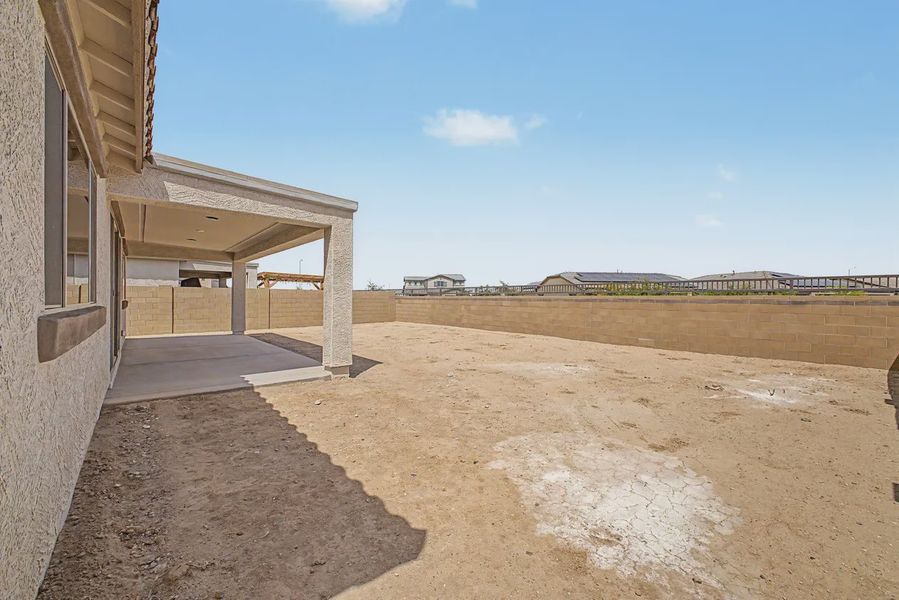 Exterior details and patio area of a home in Forté at Granite Vista, Waddell (Image 33).