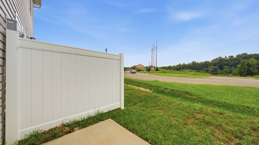 Exterior details and patio area of a home in The Arbor Townhomes, Kingsport (Image 4).