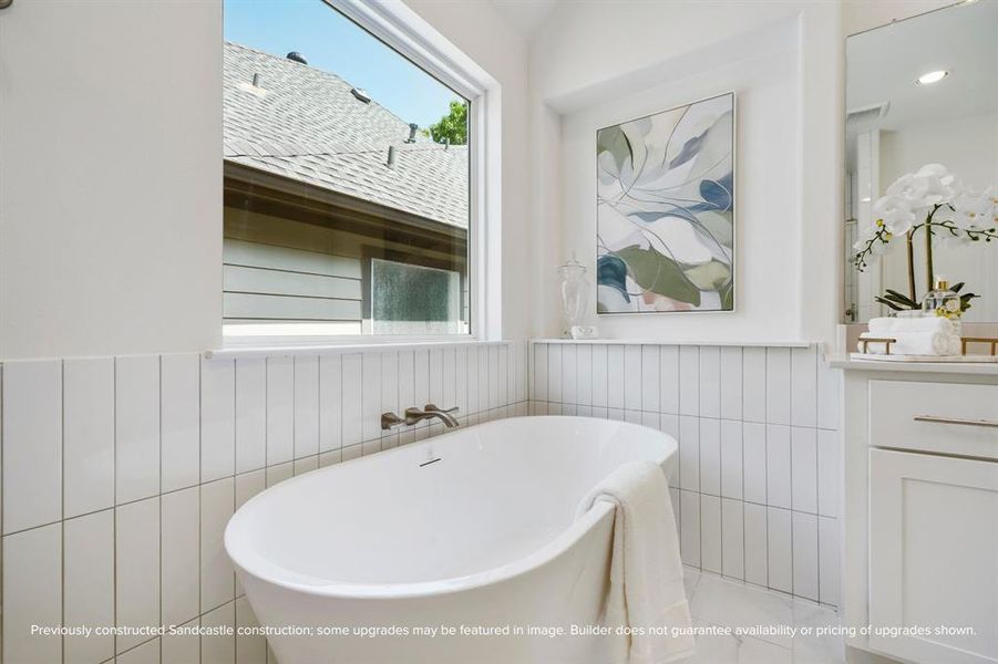 Soak in Serenity: End your days or start your weekends enveloped in the embrace of a luxurious soaking tub in this exquisitely designed primary bathroom.