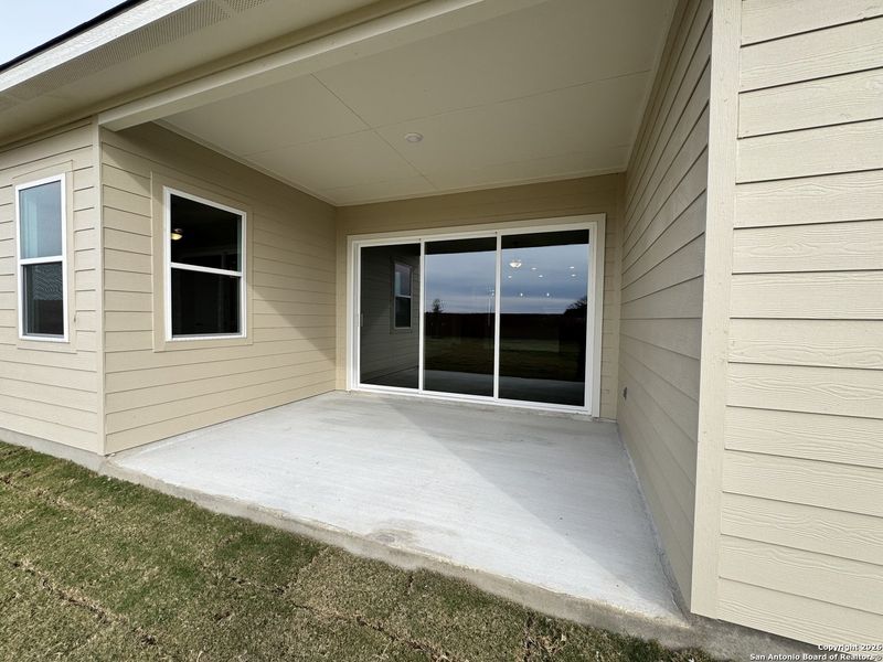 Exterior details and patio area of a home in Megan's Landing 70's, Castroville (Image 20).