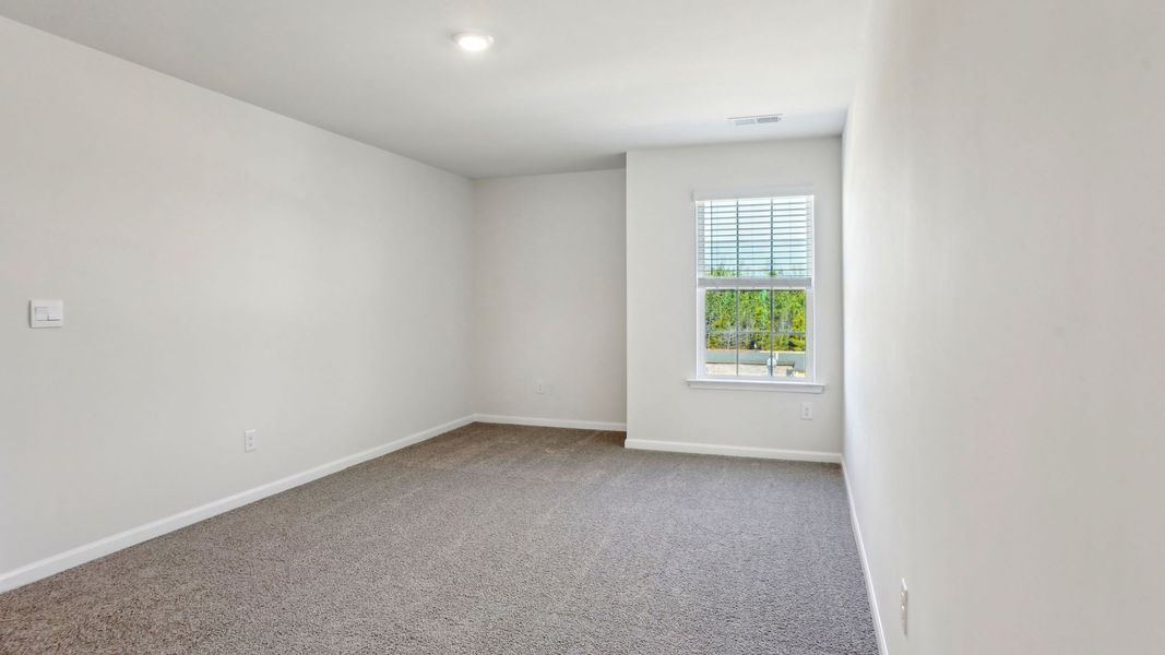 Spacious, unfurnished interior of a new home in Valleywood Farms, Waynesville (Image 28).