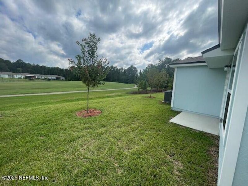Exterior details and patio area of a home in Grand Reserve, Bunnell (Image 3). Exterior details and patio area of a home in Grand Reserve, Bunnell (Image 3).