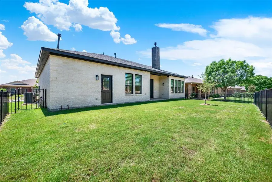 Exterior details and patio area of a home in , McKinney (Image 3).