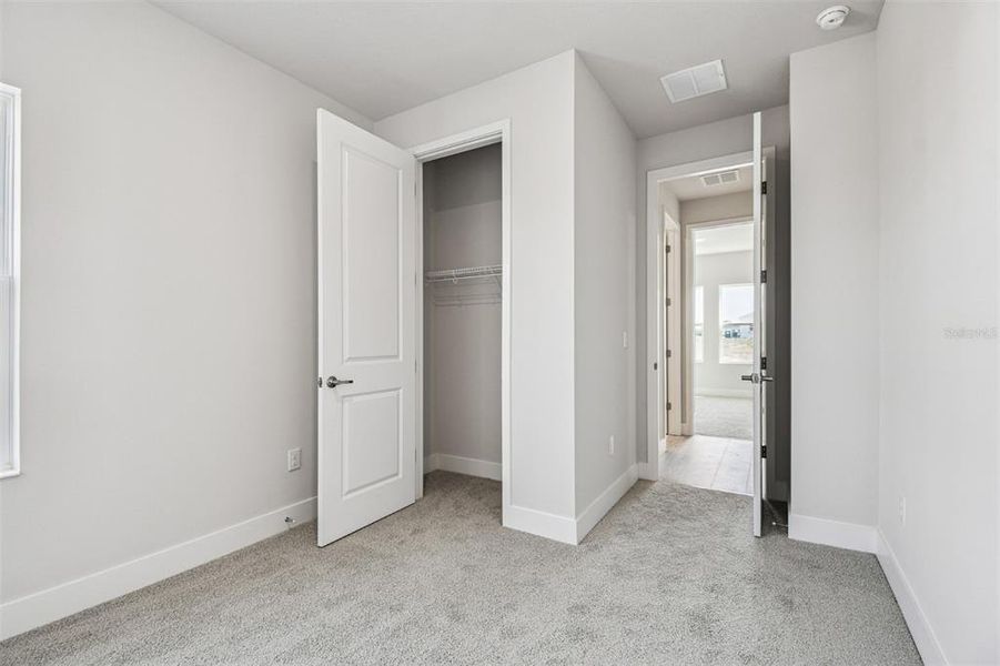 Spacious, unfurnished interior of a new home in Waterset Tradition Series, Apollo Beach (Image 28).