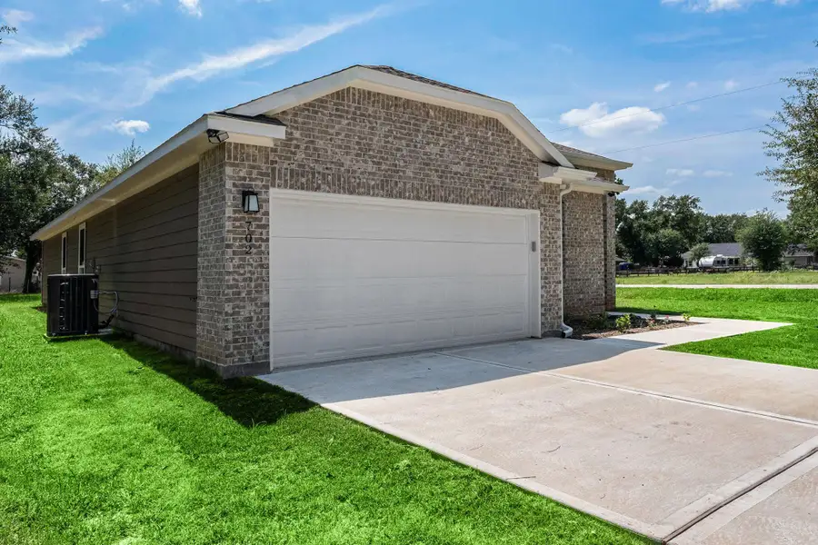 Front exterior of a new home in , Prairie View, TX, highlighting curb appeal (Image 2). Front exterior of a new home in , Prairie View, TX, highlighting curb appeal (Image 2).