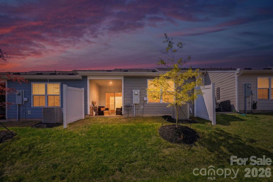 Exterior details and patio area of a home in , Troutman (Image 24).