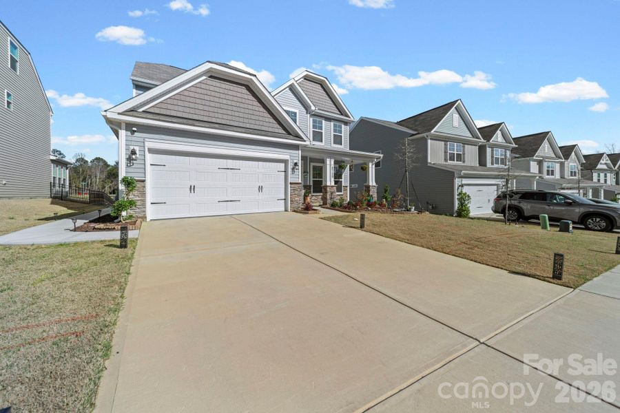 Front exterior of a new home in , Charlotte, NC, highlighting curb appeal (Image 23). Front exterior of a new home in , Charlotte, NC, highlighting curb appeal (Image 23).