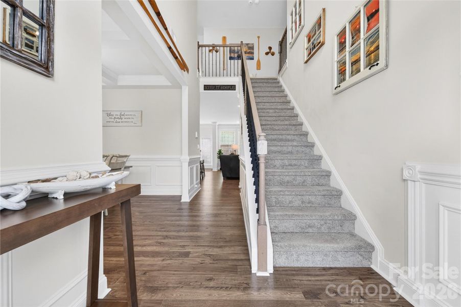 Welcoming Entry with LVP flooring on main and upper levels.