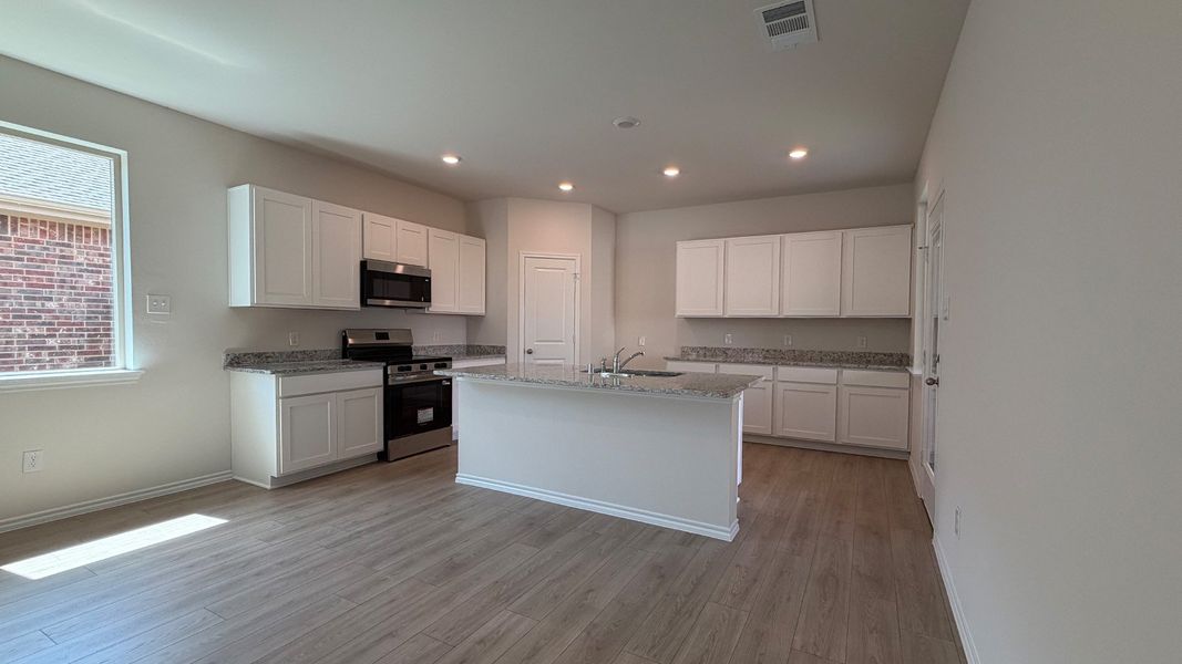 Furnished interior view inside a new home in Wildcat Ranch, Crandall (Image 7).