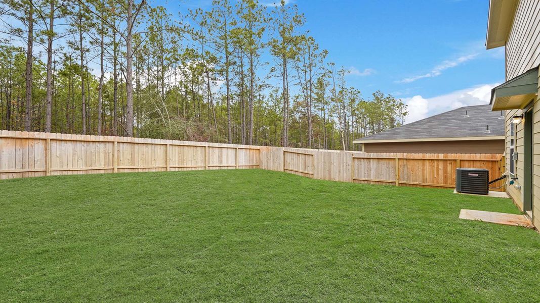 Exterior details and patio area of a home in McCrorey Trails, Conroe (Image 4).