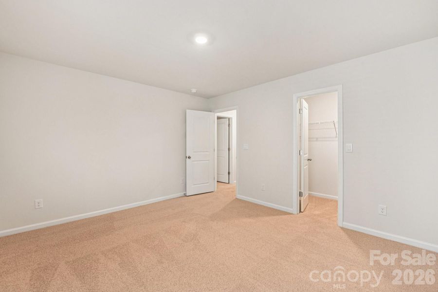 Spacious, unfurnished interior of a new home in Wallace Springs, Statesville (Image 21).