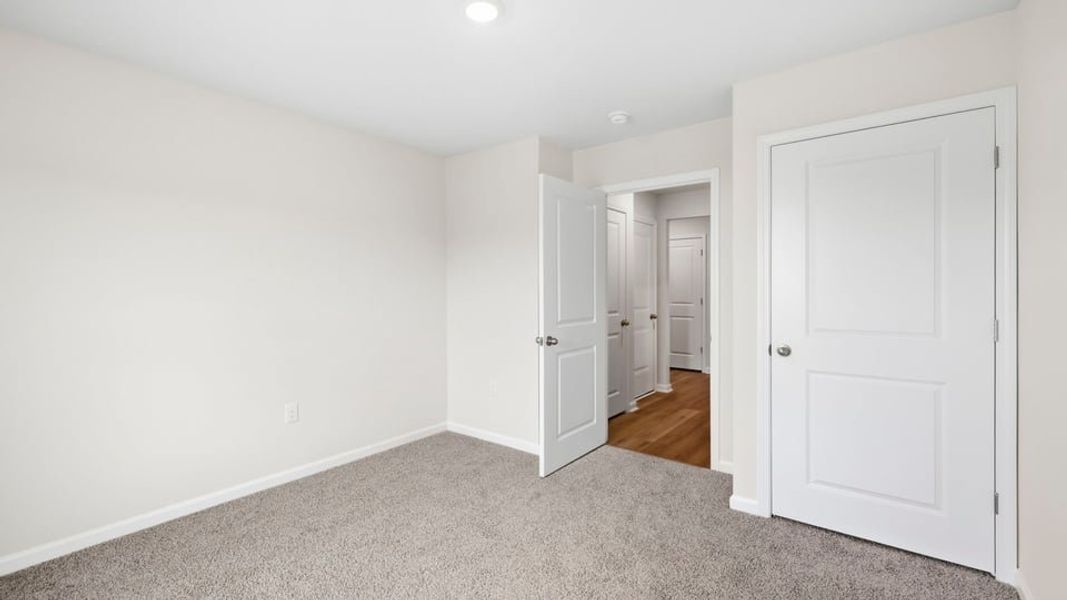 Spacious, unfurnished interior of a new home in Lakestone, Woodruff (Image 25).