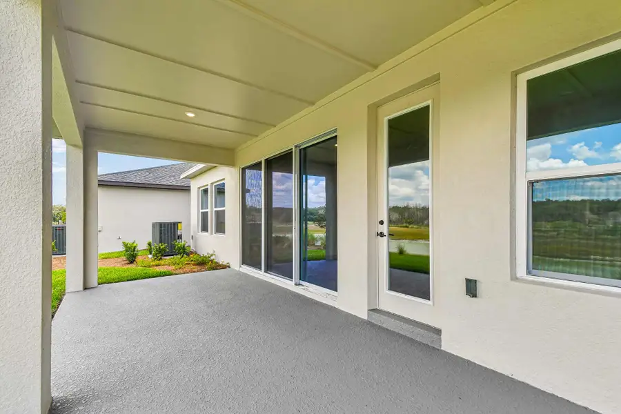 Representative exterior details of a home built from the The Collins by David Weekley Homes in Palmeras at Crossprairie – The Grove Collection, St. Cloud (Image 3).