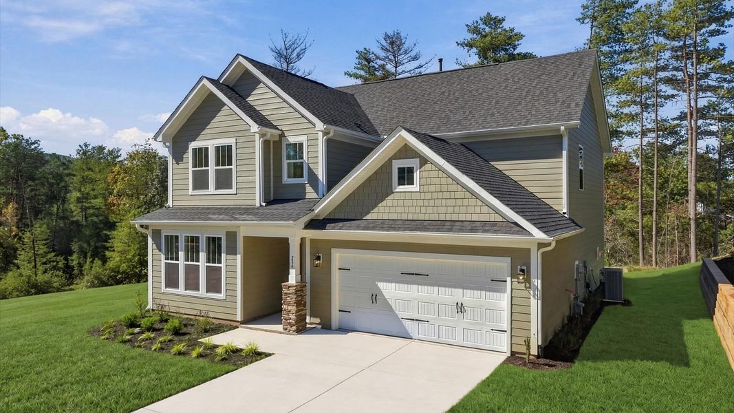 Front exterior of a new home in The Wilds at Cedar Mountain, Asheville, NC, highlighting curb appeal (Image 22).