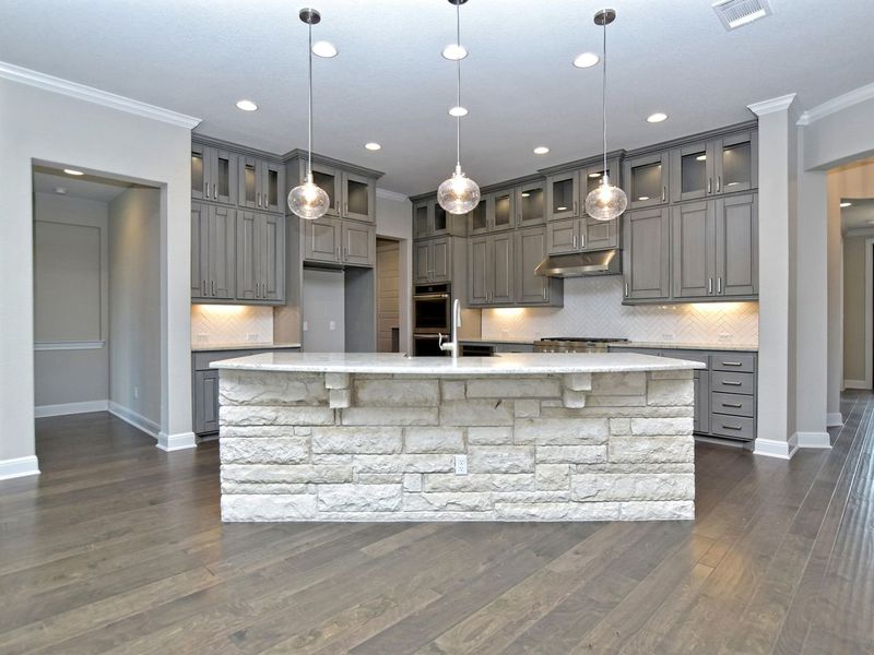 Representative furnished interior of a home built from the Madera II by Giddens Homes in Scofield Farms Estates, Georgetown (Image 178).