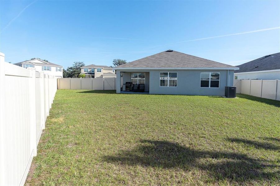 Exterior details and patio area of a home in , Wesley Chapel (Image 16).