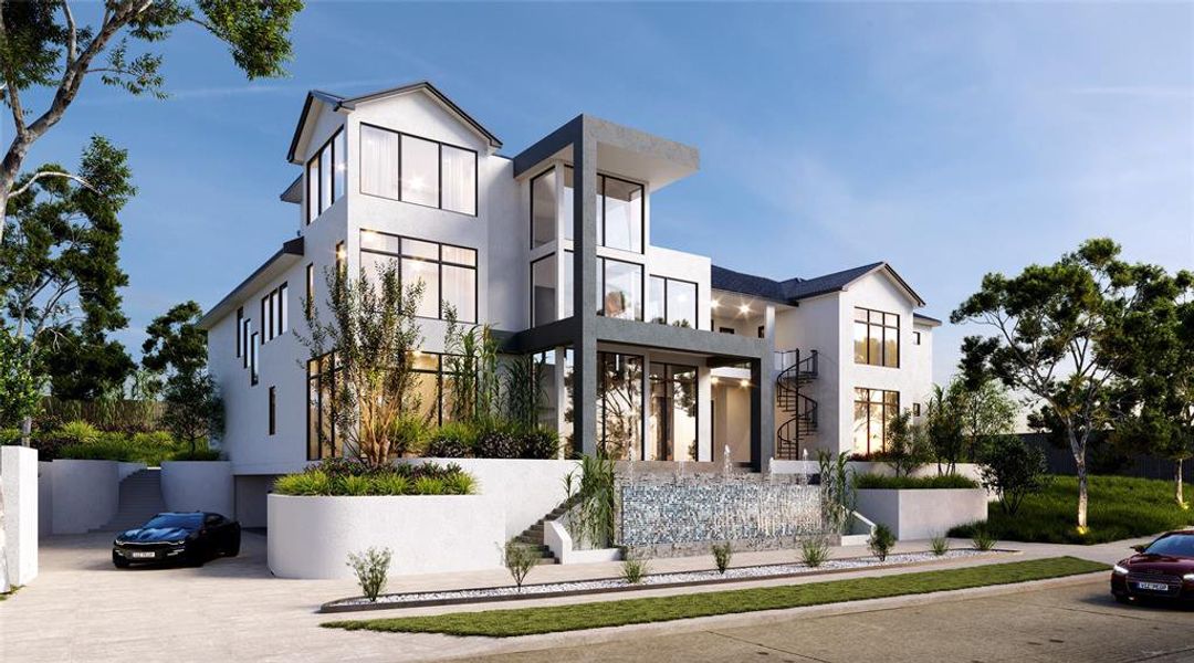 Modern home featuring stairway, stucco siding, driveway, and a fenced front yard