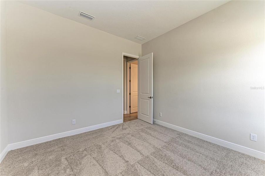 Spacious, unfurnished interior of a new home in EVERLY at Wellen Park, Venice (Image 34).