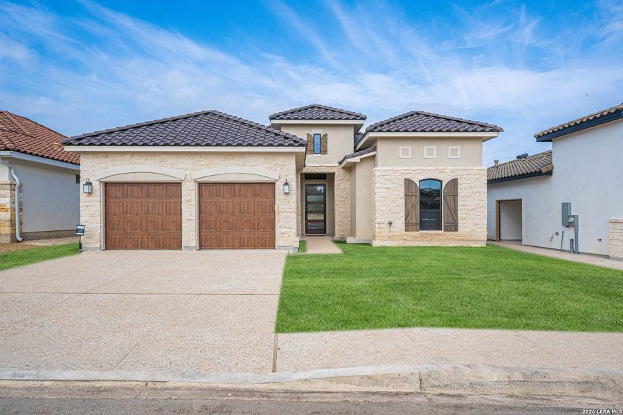 Front exterior of a new home in , Kerrville, TX, highlighting curb appeal (Image 1). Front exterior of a new home in , Kerrville, TX, highlighting curb appeal (Image 1).