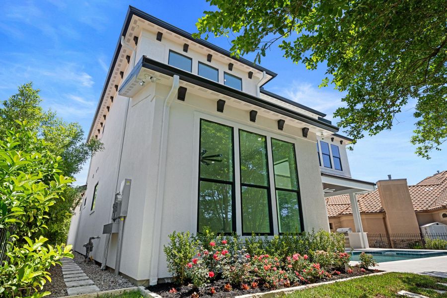 Front exterior of a new home in , Spring, TX, highlighting curb appeal (Image 1).
