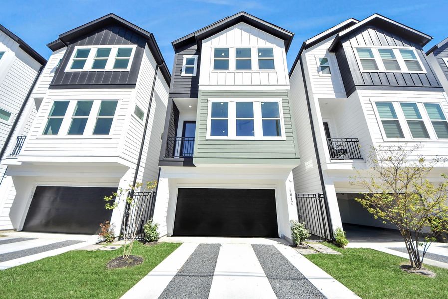 Front exterior of a new home in Skyline Homes at Cavalcade, Houston, TX, highlighting curb appeal (Image 26). Front exterior of a new home in Skyline Homes at Cavalcade, Houston, TX, highlighting curb appeal (Image 26).