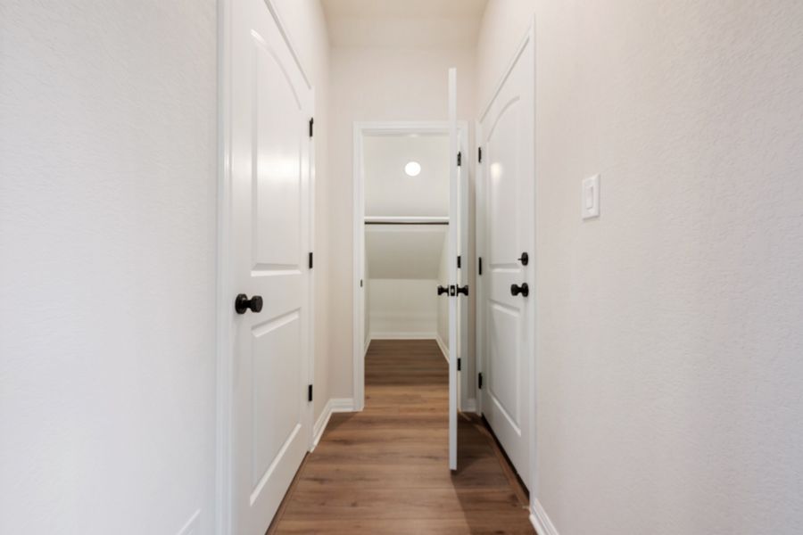 Representative unfurnished interior of a home built from the Robin by Ashton Woods in The Cottages at Lariat, Liberty Hill (Image 36). Representative unfurnished interior of a home built from the Robin by Ashton Woods in The Cottages at Lariat, Liberty Hill (Image 36).