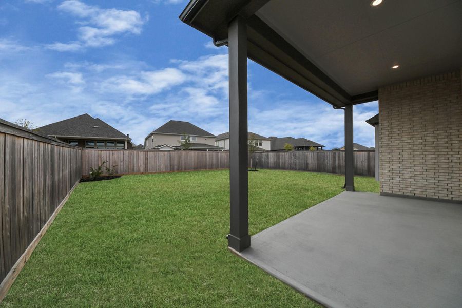Exterior details and patio area of a home in Bridgeland: Heritage Collection, Cypress (Image 25).