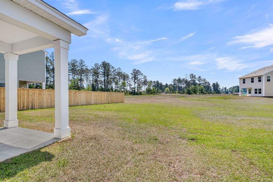 Exterior details and patio area of a home in Wildcat Chase, Summerville (Image 24).