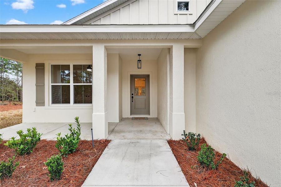 Exterior details and patio area of a home in , Wildwood (Image 3).