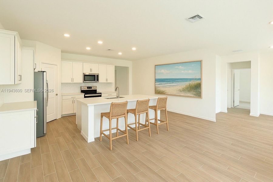 Furnished interior view inside a new home in Sabal Pointe, Jensen Beach (Image 7).