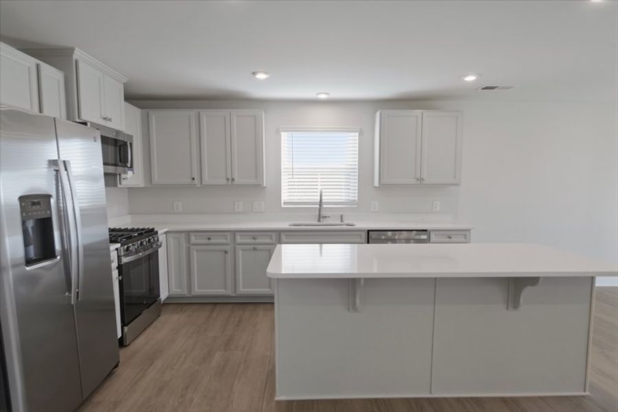 Furnished interior view inside a new home in Reidville Town Center Cottages, Duncan (Image 5).
